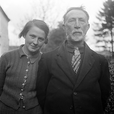Domhnall Ó Céilleachair and his daughter, Nonie Bán, Nonie (Nóra) Ní Chéilleachair (with the kind permission of the National
                  Folklore Collection, UCD)